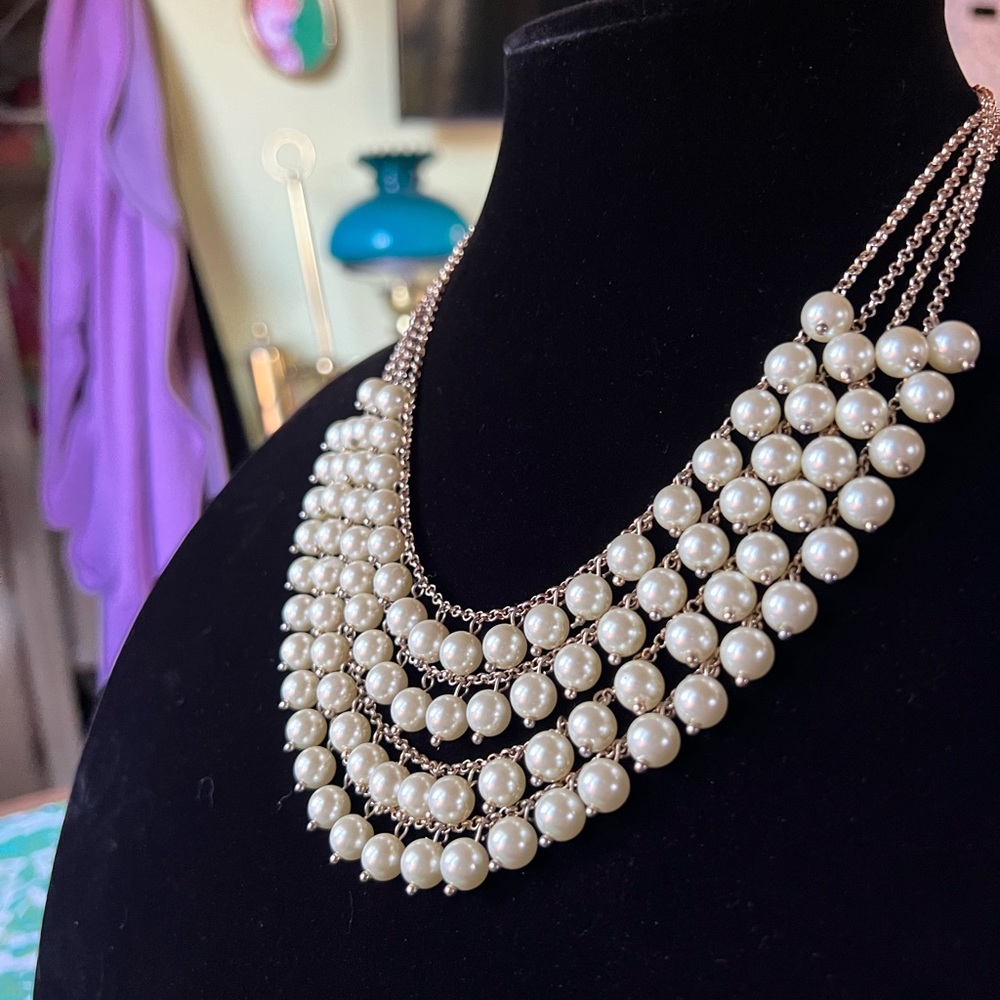 Beautiful 4-tiered pearl necklace. Costume jewelry